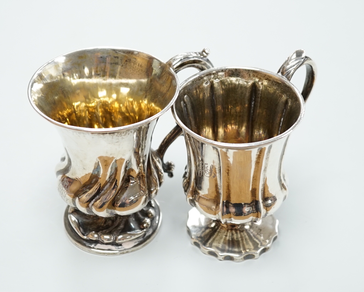 Two William IV silver vase shaped christening cans, London, 1831 and London, 1834, both approx. 9cm, 7.7oz.